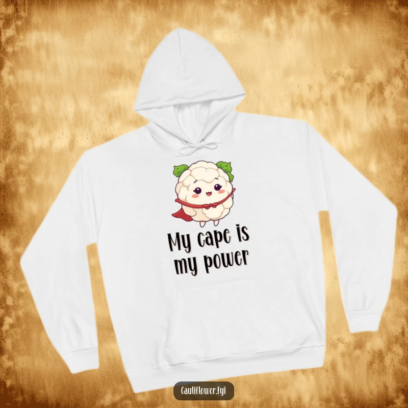Funny hoodie showing a cauliflower with a cape dramatically pretending to fly, embodying the spirit of a small but mighty hero.