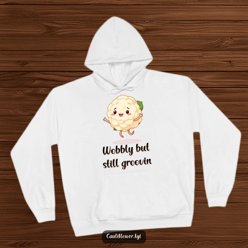 Funny hoodie featuring a cheerful cauliflower engaged in a chaotic, wobbly dance routine, legs flailing with comical abandon.
