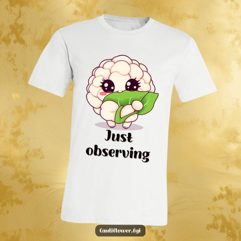 Funny Kawaii cauliflower t-shirt depicts a veggie with large, sparkling eyes peeking mischievously from behind a large leaf.